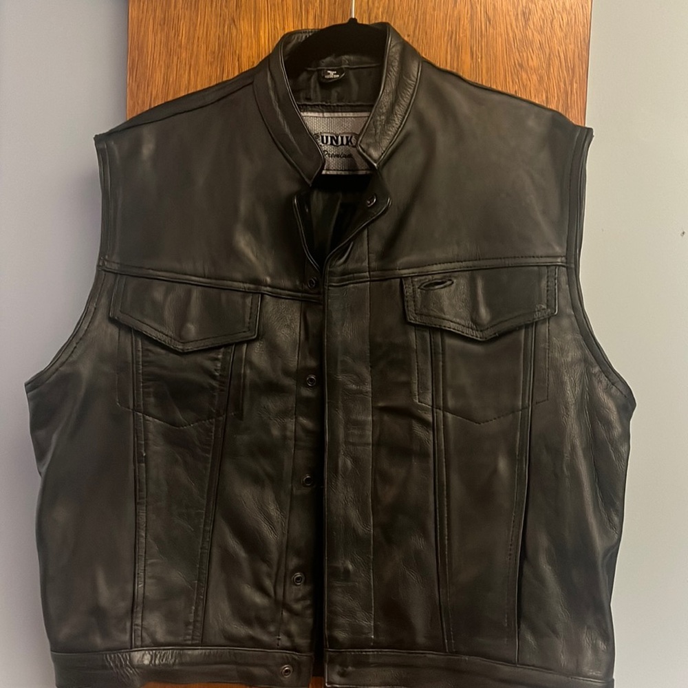 2 motorcycle vest, motorcycle bag and patches